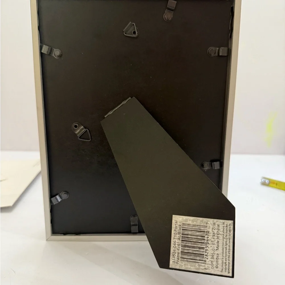 New. Shadow box picture frame for 4X6 blk/ brushed nickel